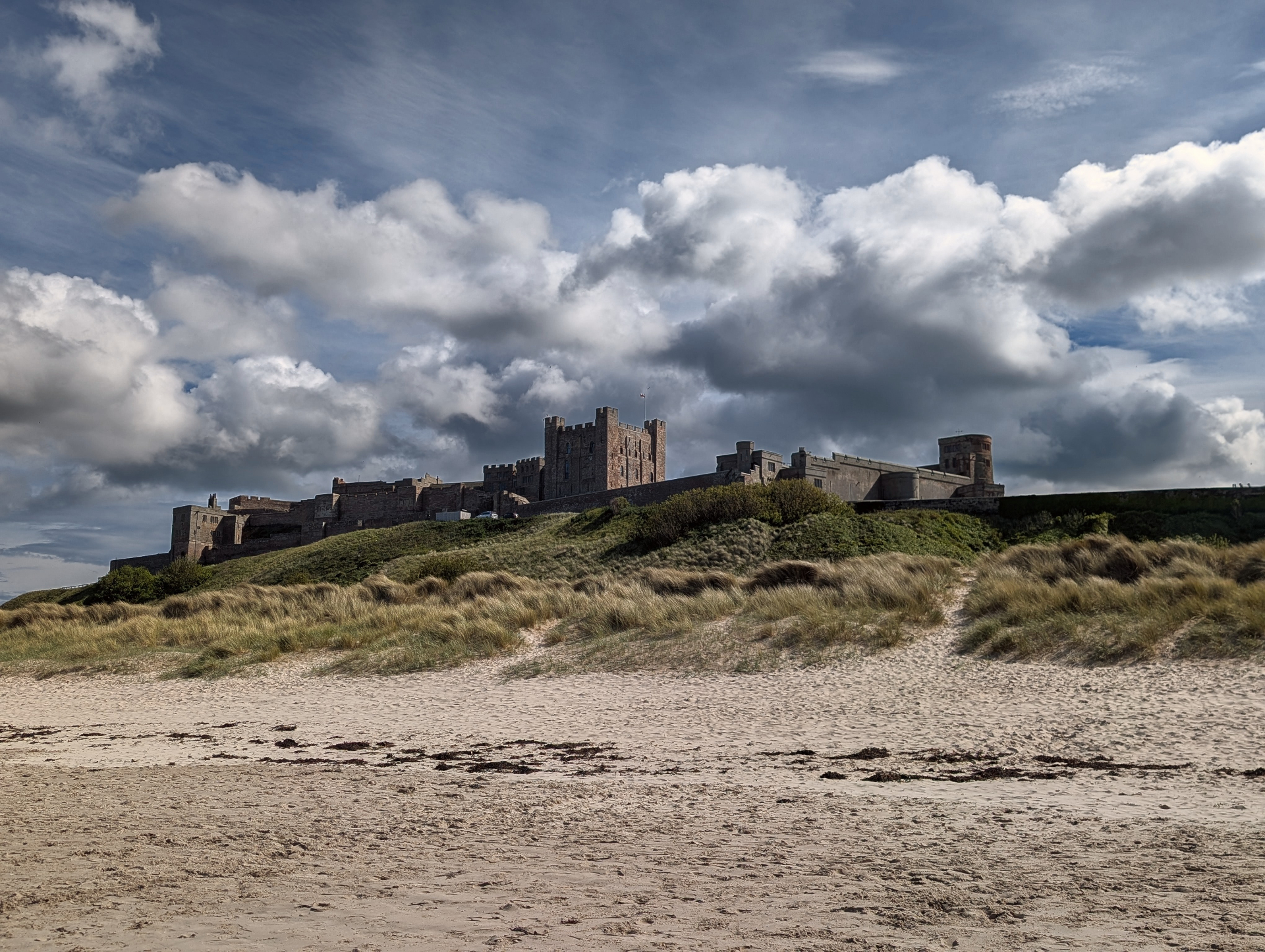 Bamburgh Castle rising above the dunes on the Northumberland coast