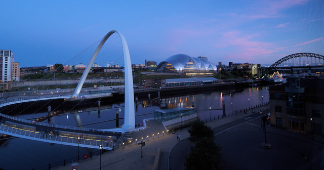 Newcastle Quayside at night with the illuminated Tyne Bridge and busy riverside bars